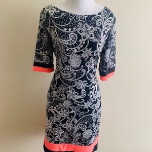 Karen Stevens black, white, and melon dress